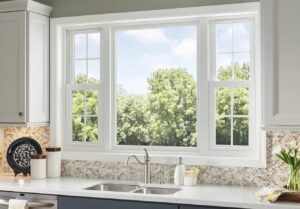 Picture of beautiful replacement windows over a kitchen sink.